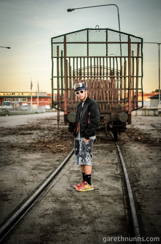 Kristian David model photoshoot on train tracks