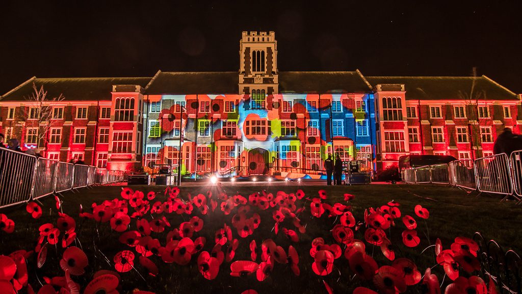 Rememberance Sunday Poppies projection mapped onto the Hazlerigg Building at Loughborough University