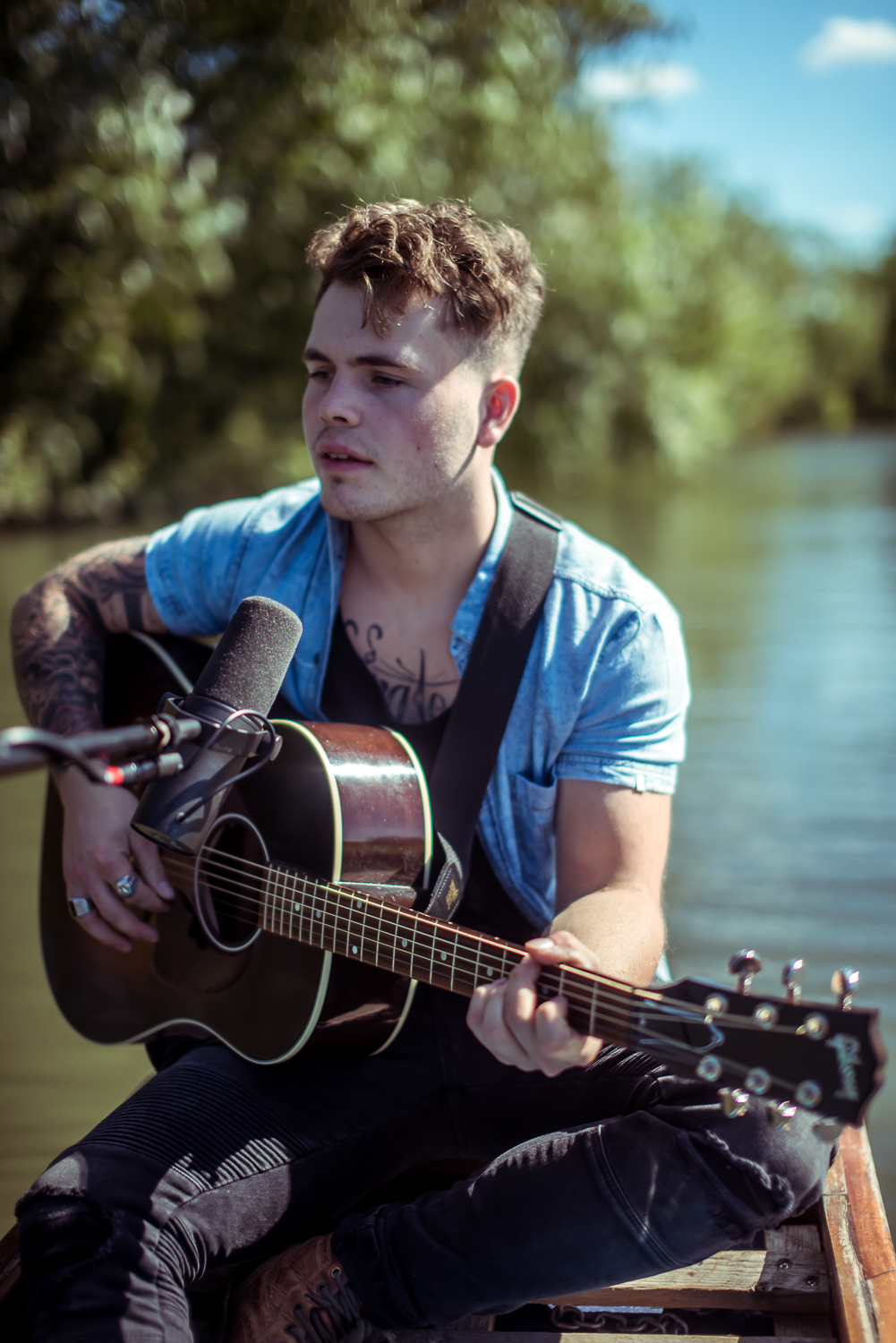 Oscar Corney recording a music video on a punt for the Bridge Sessions in Granchester, Cambridge