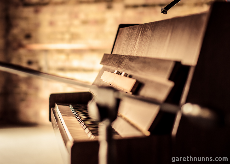 Piano in rustic setting
